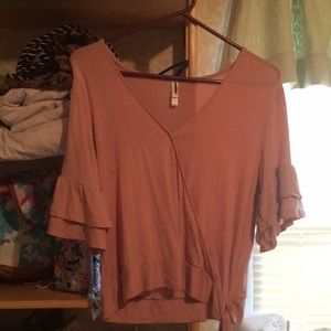 Kinda seer like material but size medium and a low cut front